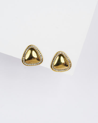 Gold triangle-shaped earrings with clear stones on a white background